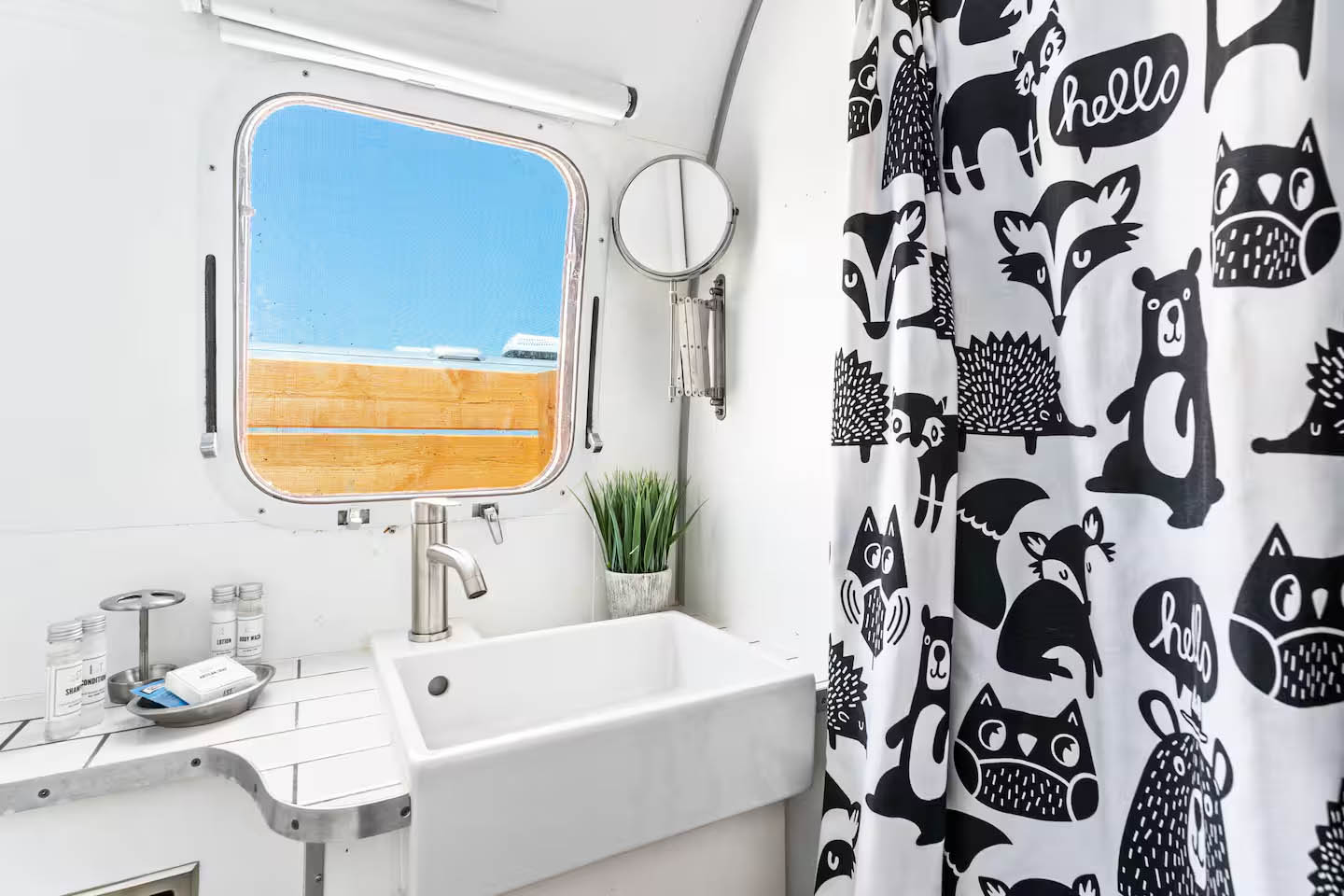 Bathroom interior inside The Joplin Airstream at Glamp Newport near Newport Rhode Island Bathroom interior inside The Joplin vintage Airstream rental at Glamp Newport in Portsmouth Rhode Island