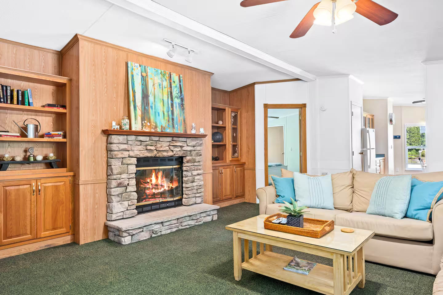 Living room and fireplace inside the 3 bedroom cottage at Glamp Newport near Newport Rhode Island Living room with fireplace inside the 3 bedroom cottage rental at Glamp Newport in Portsmouth Rhode Island
