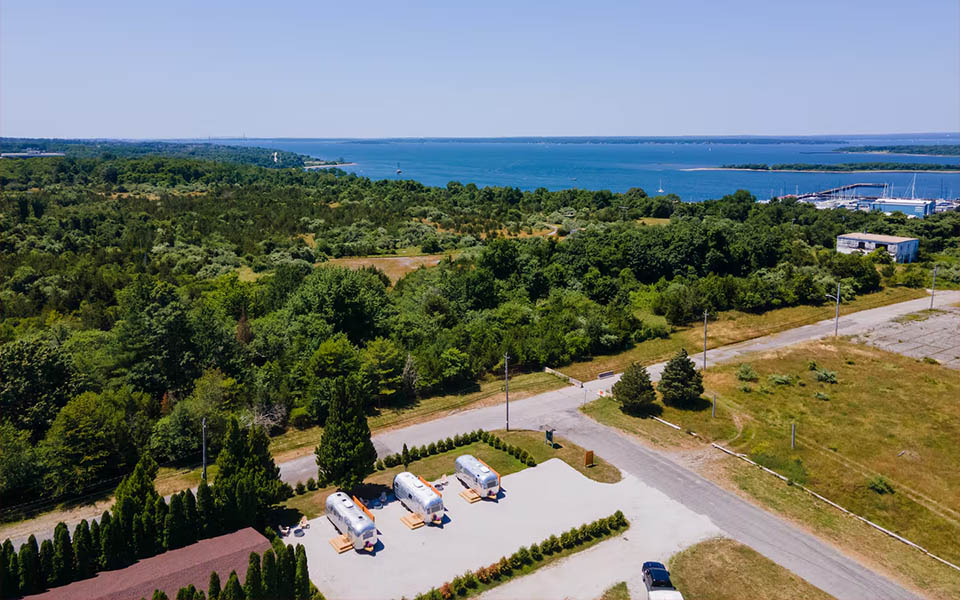 Aerial view of Glamp Newport near Newport Harbor and coastal Rhode Island attractions Aerial view of Glamp Newport Airstream rentals near Newport Harbor in Rhode Island